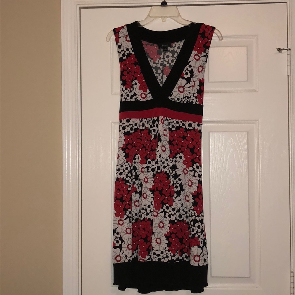 Sleeveless red, black, and white flower dress